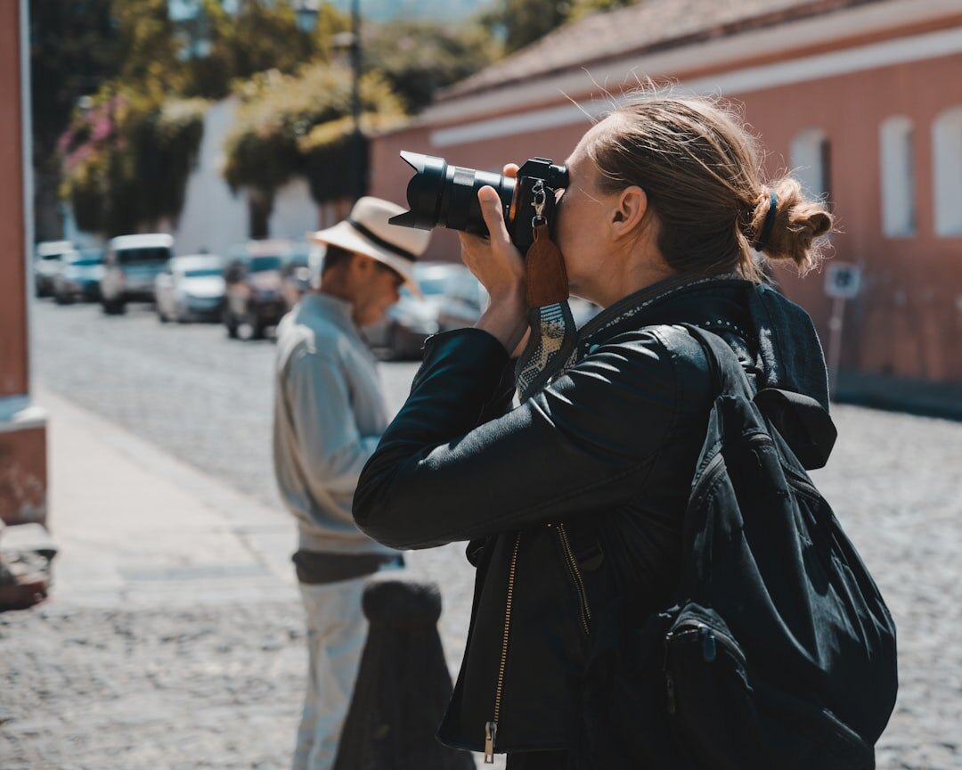 photojournalist capturing street scene