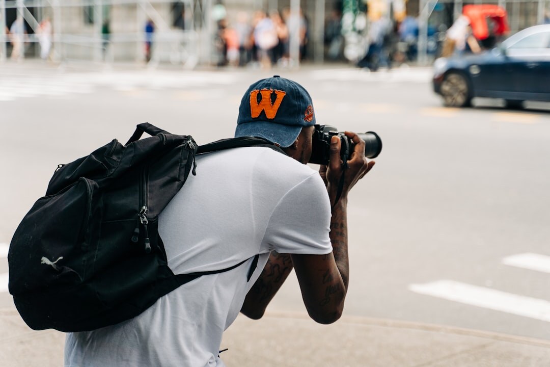 photojournalist capturing street scene